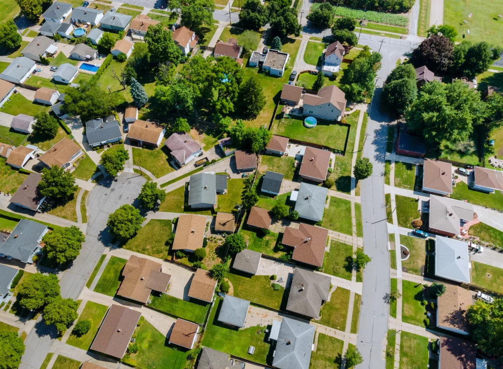 bird’s eye video of a town with trees